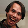 Playstation 2 - the preferred drug of the new decade.  The background was washed out and blurred to focus attention on the screaming maniac.